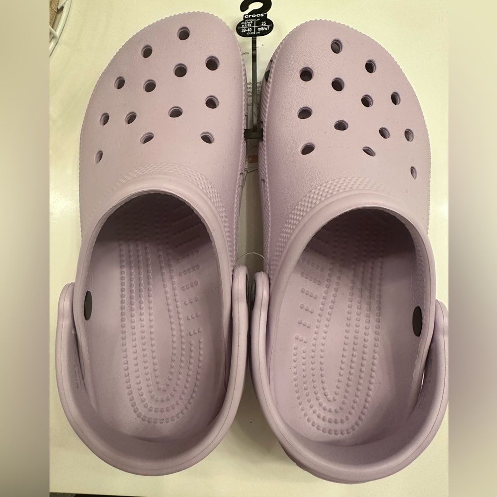 New size 9 purple crocs
